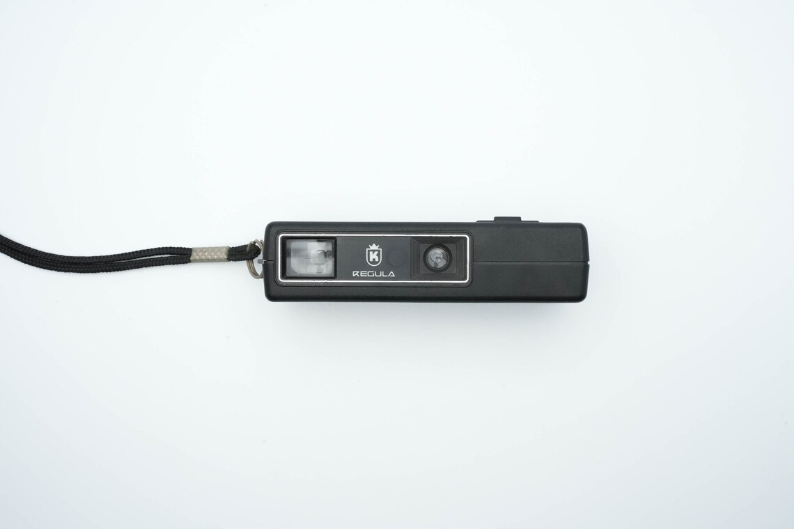 Regula 118 - vintage 110 film camera voor vakantie, foto 1 di 4