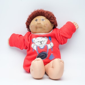 Vintage Cabbage Patch Kids Doll – Signed by Xavier Roberts (Collector’s Item)