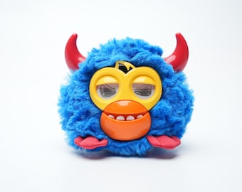 Furby Party Rockers – Azul con cuernos rojos – Funcional – Mini Furby juguetón