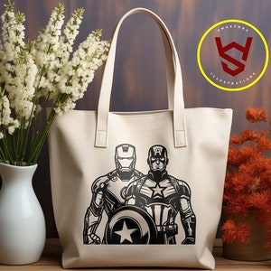 May include: Cream-colored tote bag featuring a black graphic of Iron Man and Captain America. The bag has two handles and is displayed with white flowers in a vase and text that says AI, SVG, EPS, DXF, PNG.