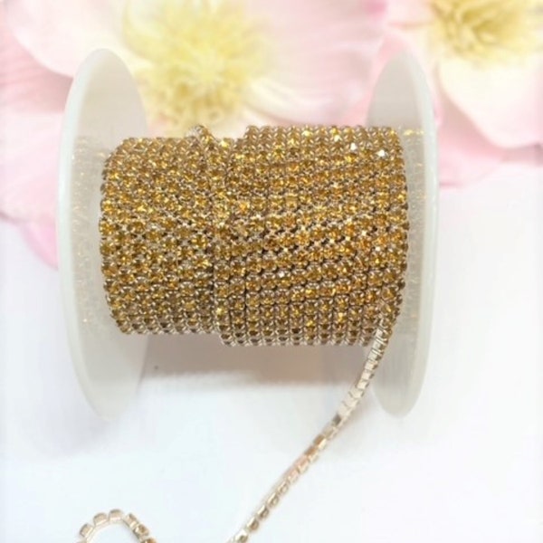 1 YARD 2mm Rhinestones Cup Chain Topaz Color In Light Gold Color Setting SS6 --- Sold by the yard