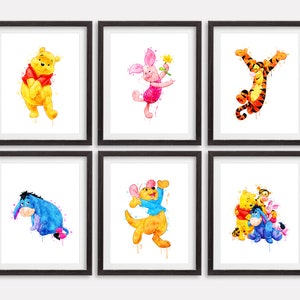 May include: Set of six watercolor prints featuring various Disney characters, including Winnie the Pooh, Piglet, Tigger, and Eeyore. Each print is framed in a black frame with a white mat.