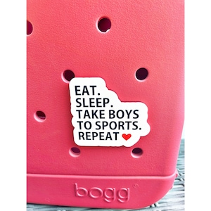 Bogg bag pop in, bogg bag bit, eat sleep take boys to sports, sports mom pop in, bogg bag tag, sports bogg bit, take boys to sports bit