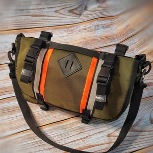 Handlebar bag cycling gear for ride trip. Bike bag. Bicycle gear. Bike accessory. Burrito bag bike. Gravel bike handlebar bag