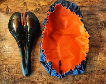 Seat cover for Bicycle saddle cover double-sided. A gift for a bicyclist traveler. Bag for biking and bikepacking. Bike saddle protection.