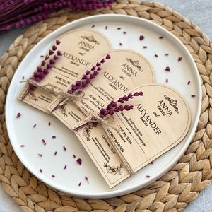 There are personalized inscriptions and flowers on the wood.