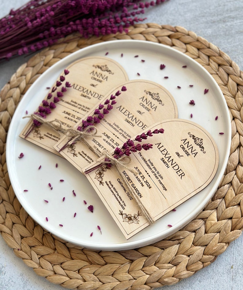 There are personalized inscriptions and flowers on the wood.