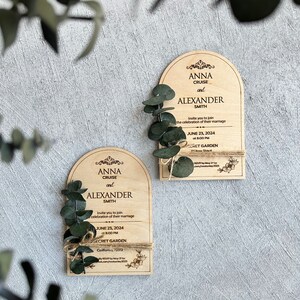 There are personalized inscriptions and flowers on the wood.