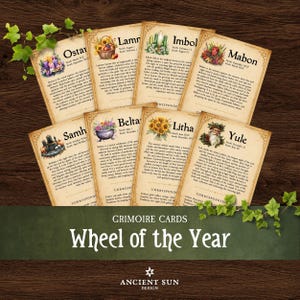 May include: A set of eight rectangular Grimoire cards titled Wheel of the Year, featuring parchment-style paper with printed text and illustrations for Ostara, Lammas, Imbolc, Mabon, Samhain, Beltane, Litha, and Yule, accented by green ivy leaves.