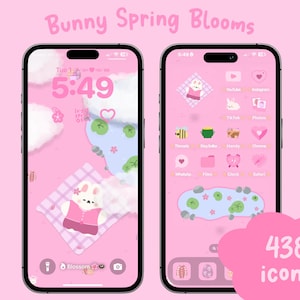 May include: A pink and white phone screen with a bunny and flowers. The phone screen has a clock that reads 5:49. The text "Bunny Spring Blooms" is at the top of the screen. The text "438 icons" is in a pink cloud at the bottom of the screen.