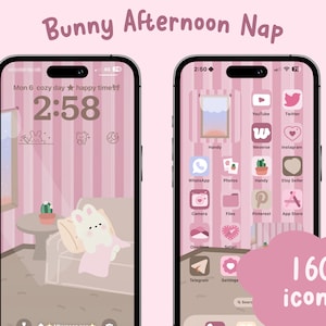 May include: A pink and white phone screen with a cartoon bunny sleeping on a sofa. The phone screen has a pink and white striped background with a cactus and a window. The phone screen also has a clock that says 2:58. The phone screen has a total of 160 icons.