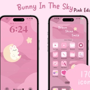 May include: A pink and white phone screen with a bunny on a crescent moon, stars, and the text "Girly pink". The phone screen is part of a larger image showing a pink phone with a pink and white home screen with the text "Dream Shine Smile" and "170 icons".