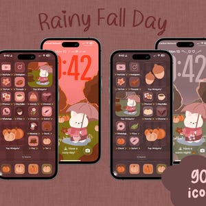 May include: Four smartphones displaying a fall-themed home screen with a cartoon cat under an umbrella. The screens feature icons, widgets, and the text "Rainy Fall Day." The image includes the text "906 icons."