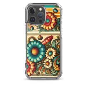 Peut inclure: Coque de téléphone transparente avec un motif floral. L'étui présente une illustration vibrante de fleurs dans des tons orange, sarcelle et blanc, avec des feuilles vertes et des accents dorés. Le motif est posé sur un fond beige.