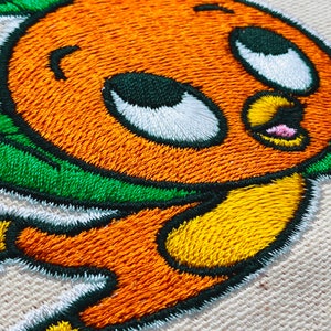 Orange bird tote bag , epcot adventureland enchanted tiki room embroidered iron on patch