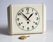 Junghans Ceramic Wind-up Kitchen Wall Clock with Pendulum