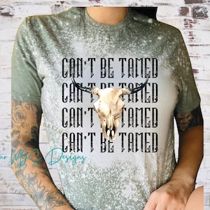 Can&#39;t Be Tamed ブリーチ T シャツ、ブリーチ スウェットシャツ、大人/ユース/幼児サイズのクルーネック、カントリー ミュージック ウェア、ナッシュビル