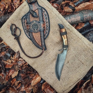 Custom  handmade hand forged blacksmith primitive knife with leather sheath