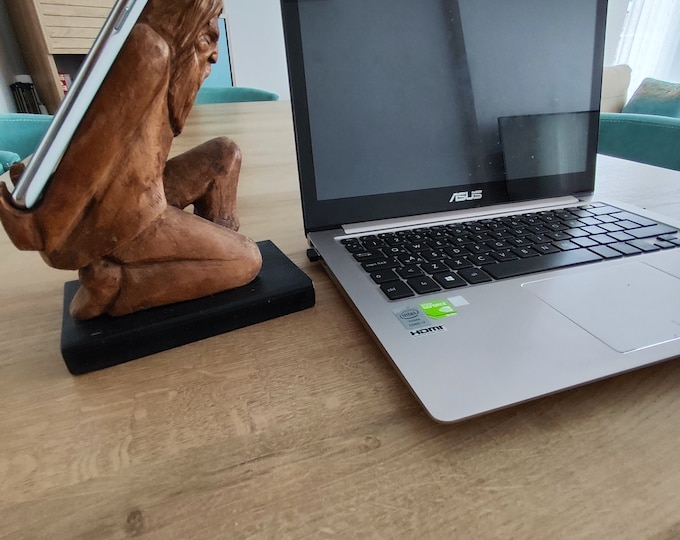The Burden on Technology's Shoulders: Wooden Elder and Smartphone Stand