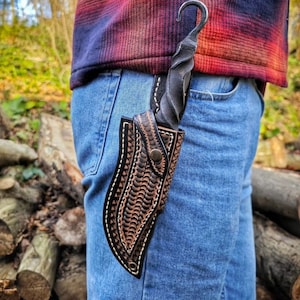 Blacksmith  hand forged primitive style  custom carbon steel knife with leather sheath