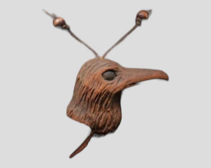 Handmade Crow-shaped Carved Pendants with Symbolic Meaning - Unique and Mystical Jewelry