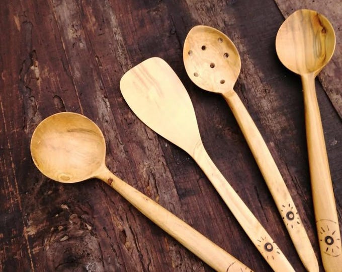 hamd carved rustic kitchen gear