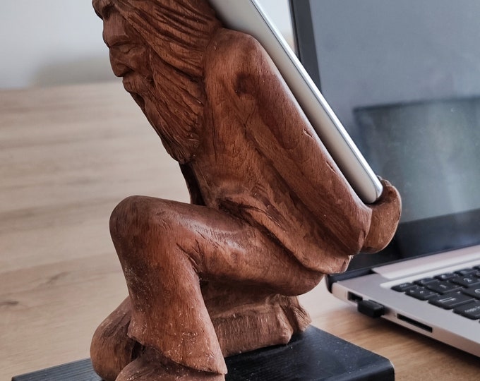 The Burden on Technology's Shoulders: Wooden Elder and Smartphone Stand