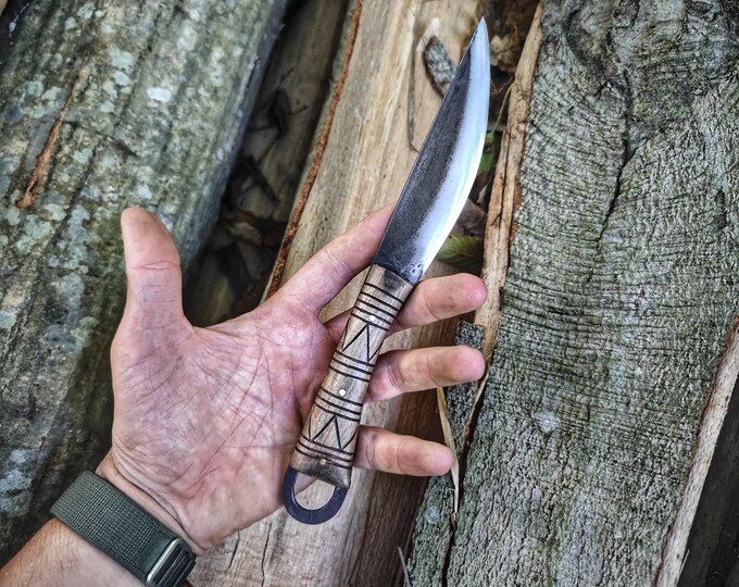 Viking style primitive blacksmith carbon steel handmade custom knife with natural genuie leather sheath.