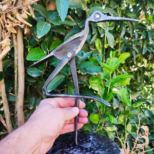 Blacksmith hand forged bird sculpture