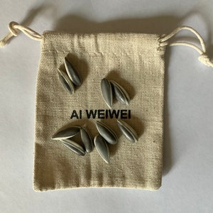 Ai Weiwei - 10 Porcelain Sunflower Seeds with Jute Bag