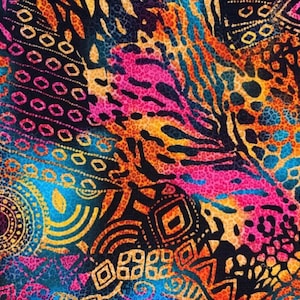 May include: A vibrant textile featuring a patchwork of colorful patterns. The design incorporates geometric shapes, animal prints, and tribal motifs in shades of pink, orange, yellow, blue, and black. The overall effect is a bold and eclectic design.