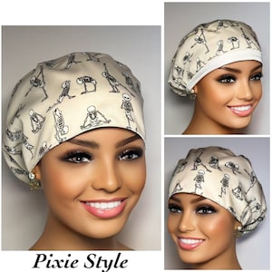 May include: A beige scrub cap with a white trim and a pattern of skeletons doing yoga poses. The text "Pixie Style" is printed below the image.