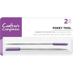 May include: Two stainless steel pokey tools with rubber tip protectors. The tools are packaged in a white and purple box with the text "Crafter's Companion" and "POKEY TOOL".