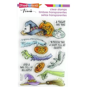 May include: Clear stamp set with a Halloween theme. The set includes images of a witch's hat, a pumpkin, a cat, a hand reaching out, a broom, and the text "A Treat For You", "Witching You A Night Full Of Frights", and "And A Bag Full Of Delights!"