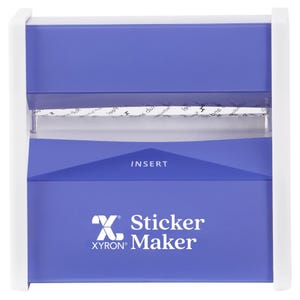 May include: A purple and white sticker maker with the text "X Sticker Maker" and "XYRON" on the front. The machine has a clear window to insert paper.