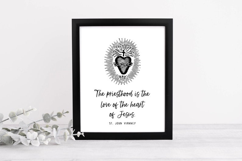 May include: Black and white print with a quote about the priesthood. The quote reads "The priesthood is the love of the heart of Jesus." and is attributed to St. John Vianney.