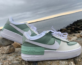 sage green nike shoes