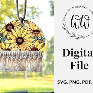 May include: A digital file for a sunflower-themed car charm with a white tassel. The charm is a half-circle shape with a sunflower pattern and the text "Wandering Woods Designs" in a circle with the letters "WW" inside.