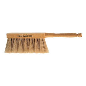 May include: A wooden dust brush with a natural bristle brush head and a wooden handle. The handle has the text "Faber-Castell 1600" printed on it.