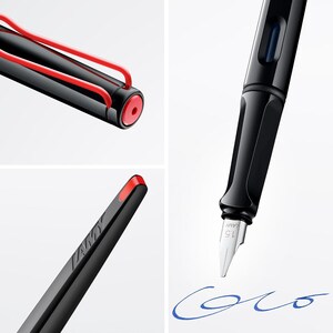 May include: A black fountain pen with a red clip and a silver nib. The pen is writing in blue ink on a white surface. The text "1.5 mm" is visible on the nib.