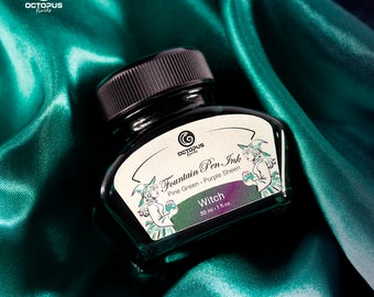 May include: A 30 ml bottle of "Witch" fountain pen ink by Octopus Fluids. The ink is a pine green color with a purple sheen. The bottle has a label with a witch illustration.