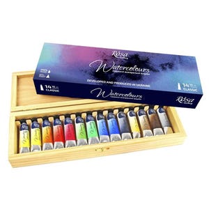May include: A wooden box set of 14 classic watercolor paints. The box lid is dark blue with the words "Watercolours" and "Rósa Gallery" in white script. The paint tubes are arranged in a wooden box, each with a different color.