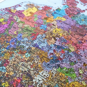 May include: A detailed map of Germany in the 16th century, showing the various principalities and territories that existed at the time. The map is colorful and includes many place names, such as M&uuml;nster, Bremen, L&uuml;neburg, and Mainz.