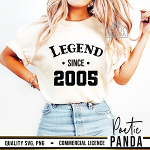 May include: White t-shirt with black text that reads "LEGEND SINCE 2005".