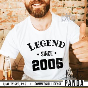 May include: White t-shirt with black text that reads "LEGEND SINCE 2005".