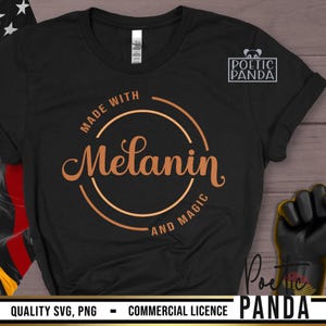 May include: Black t-shirt with a copper-coloured circle design that says "Made with Melanin and Magic".