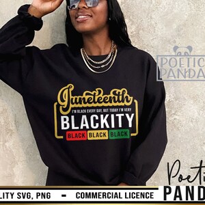 May include: A black sweatshirt with a gold graphic that says "Juneteenth I'm Black Every Day, But Today I'm Very Blackity" with three black squares that say "Black" in gold letters.