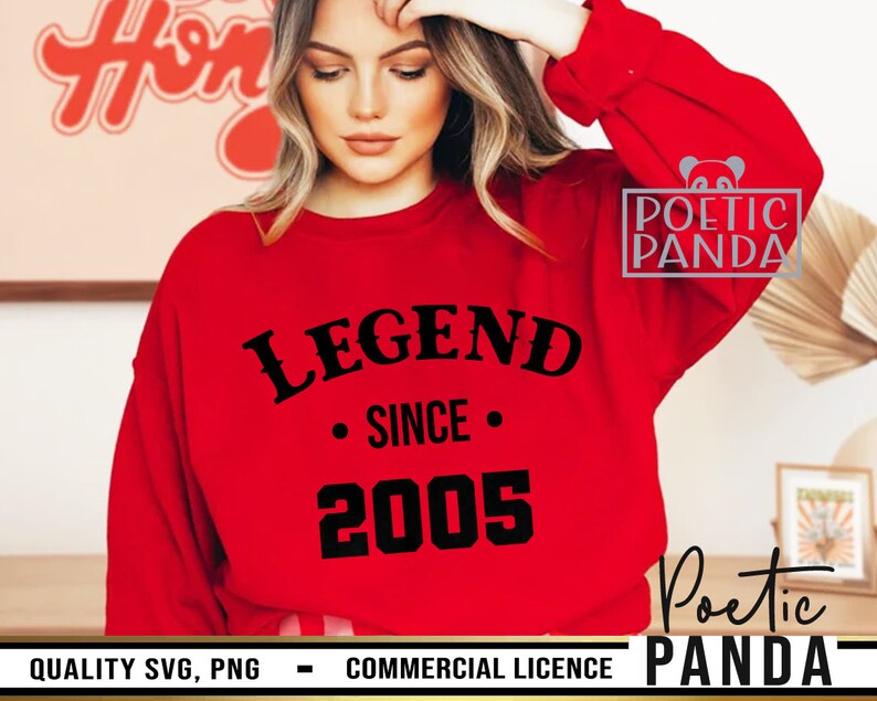 May include: Red sweatshirt with black text that reads "LEGEND SINCE 2005". The text is in a bold, blocky font. The sweatshirt is being worn by a person.