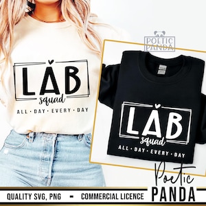 May include: Two white t-shirts with black text that reads "LAB squad ALL DAY EVERY DAY". The text is in a box with a heart above the word "LAB". One shirt is on a model and the other is flat on a black surface.