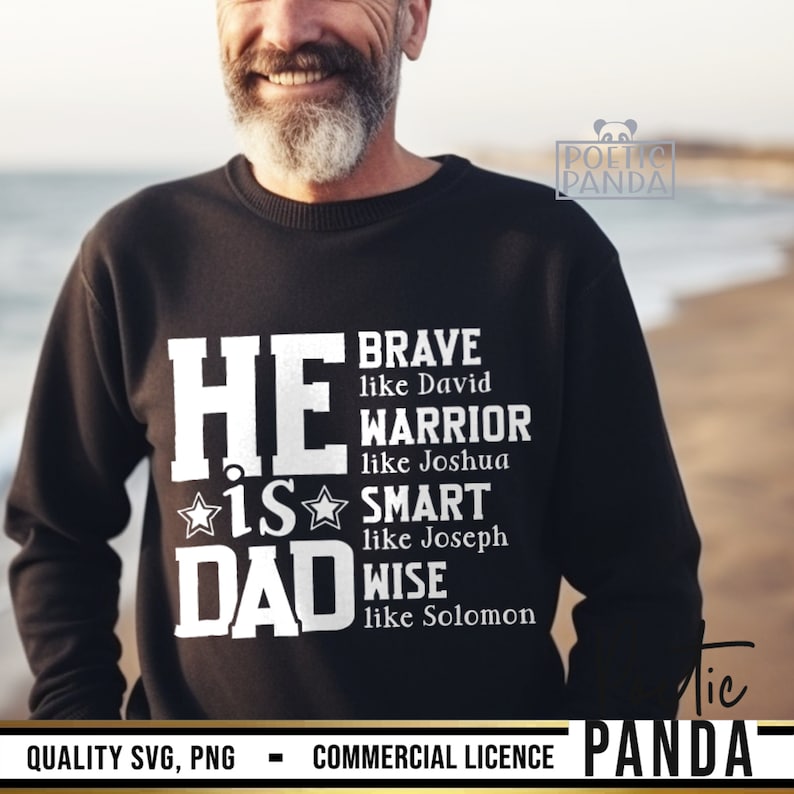 May include: Black sweatshirt with white text that reads "HE IS DAD" with additional text listing qualities like "Brave," "Warrior," "Smart," and "Wise." The sweatshirt is worn by a person smiling in front of a blurred background.